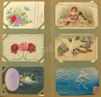 164 db RÉGI képeslap vegyes minőségben kis szecessziós albumban: sok dombornyomott és litho üdvözlő,...