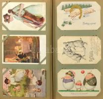 164 db RÉGI képeslap vegyes minőségben kis szecessziós albumban: sok dombornyomott és litho üdvözlő,...