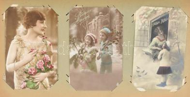 164 db RÉGI képeslap vegyes minőségben kis szecessziós albumban: sok dombornyomott és litho üdvözlő,...