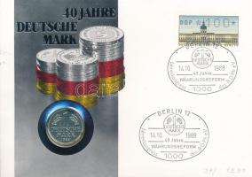 NSZK 1988J 1M Cu-Ni "A német márka 40. évfordulója" felbélyegzett, sorszámozott borítékon, alkalmi bélyegzéssel T:BU patina FRG 1988J 1 Mark Cu-ni "40th Anniversary of the German Mark" in serial numbered envelope with stamp and cancellation C:BU patina