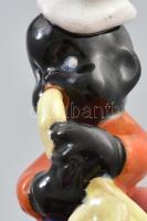 Komlós: Fekete trombitás. Színes mázakkal festett art deco kerámia. Apró lepattanással. Jelzett. m: ...