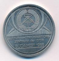 NDK 1988. "Az NDK. Kulturális és Tájékoztató Központjának kiállítása 1988 októberében Budapesten" kétoldalas, német nyelvű Fe emlékérem (35mm) T:AU GDR 1988. "Kultur- und Informationszentrum der DDR - Budapest 1988" two-sided Fe medallion with German text (35mm) C:XF