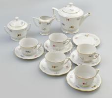 Zsolnay virágmintás 5 személyes porcelán teás készlet. Matricás, jelzett, kopásnyomokkal, kanna fedele ragasztott és lepattanással, egyik csészealjon repedéssel.