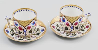 2 db Epiag gazdagon díszített teás csésze aljjal. Kézzel festett, jelzett, kis kopással d: 7,5 cm, m: 7 cm tányér 15 cm