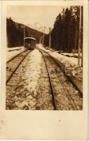 Tátra, Magas Tátra, Vysoké Tatry; fogaskerekű vasút télen, vonat / Zahnradbahn / cogwheel railway, train, winter. photo