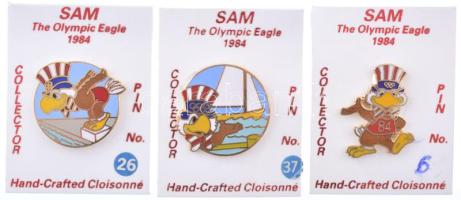 Amerikai Egyesült Államok 1984. "Sam az olimpiai sas - Los Angeles" zománcozott fém jelvény eredeti, számozott műanyag lapokon (3xklf: 6, 26, 37) T:UNC,AU USA 1984. "Sam the Olympic Eagle - Los Angeles" enamelled metal badges on original, numbered plastic sheets (3xdiff: 6, 26, 37) C:UNC,AU