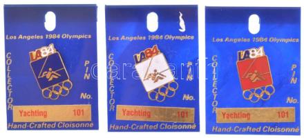 Amerikai Egyesült Államok 1984. Sportágak - Los Angeles: Vitorlázás zománcozott fém olimpiai jelvény eredeti, számozott műanyag lapokon (101, 3xklf szín) T:UNC,AU USA 1984. Sports - Los Angeles: Yachting enamelled Olympic metal badges on original, numbered plastic sheets (101, 3xdiff color) C:UNC,AU