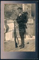 cca 1900 S.M.S.Rudolf tengerészgyalogos katona teljes felszerelésben, kitüntetéssel, vizitkártya méretű fotó / cca 1900 A young seaman (or marine) poses on the deck of S.M.S. Kronprinz Erzherzog Rudolf. He is wearing full gear: gaiters, bayonet, knife, backpack, ammunition pouch, and is holding a rifle. A decoration is pinned to his chest