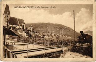Weißenkirchen in der Wachau, Weissenkirchen; railway bridge, church, locomotive, train (wet corners)