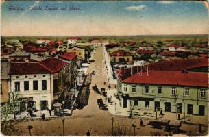Giurgiu, Gyurgyevó, Gyurgyó; Strada Stefan cel Mare / street view, shops (EM)