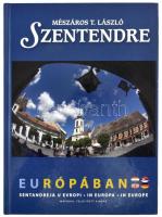 Mészáros T. László: Szentendre Európában. Írta: Pethő Zsoltné Németh Erika. - - fotóival. hn., 2014., Foto-Video Europa Kft. 2. kiadás. Kiadói kartonált papírkötés.  A volt polgármester, Dietz Ferenc ajándékozási soraival Petricskó Zoltán alpolgármester részére, nyomtatott kártya, autográf aláírással.