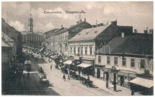 Chernivtsi, Czernowitz, Cernauti, Csernyivci (Bukovina, Bukowina); Hauptstrasse / main street, shops of Leon Wagner, Ehrlich, Leon Fuhrmann, E. Kaplonski, Singer & Rosenbaum and B. Baltinester, Gemälde Salon Grünberg