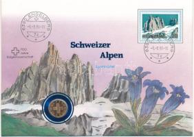 Svájc 1986B 1r bronz "Svájci Alpok - Spannörter" felbélyegzett borítékban, bélyegzéssel, német nyelvű leírással T:UNC kis patina Switzerland 1986B 1 Rappen bronze in "Swiss Alps - Spannörter" envelope with stamp, cancellation and a description in german C:UNC small patina