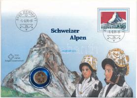 Svájc 1986B 1r bronz "Svájci Alpok - Matterhorn" felbélyegzett borítékban, bélyegzéssel, német nyelvű leírással T:UNC  Switzerland 1986B 1 Rappen bronze in "Swiss Alps - Matterhorn" envelope with stamp, cancellation and a description in german C:UNC