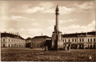 Baja, Fő tér, Szentháromság szobor, Takarékpénztár, Uttryné üzlete, A Mi Boltunk Kereskedelmi Részvénytársaság, Vasudvar, bank, Az Anker, Rádió és Villany szerelési vállalat, Kemény József hölgy fodrász és manikűr. Ifj. Wagner Antal kiadása 1927. (ragasztónyomok / gluemarks)