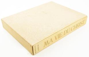 Nandor Vagh Weinmann: Ma vie du Christe. Textes de Daniel Rops... et de Raymond Charmet. [Paris], 1968, a művész kiadása. Vágh-Weinmann Nándor (1897-1978) Jézus életéről szóló festménysorozatából készült fólió album, részben merített papíron, kissé foltos kartonborítóban és kartontékában, sorszámozott (151.). Lapméret: 47x37 cm. Helyenként kissé foltos. /  Folio album edited by the artist Nandor Vagh Weinman, hard cover and cardboard box, No. 151