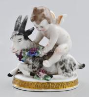 Elt Wien kecskén ülő puttó. Kézzel festett porcelán figura, virágokon kis hiánnyal, m: 7 cm