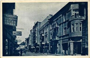 1938 Ungvár, Uzshorod, Uzhhorod, Uzhorod; Korso. Kozeshicky dum, Gellis, Schneck, Sporitelna / korzó, utca, Szörme árúház, üzletek / street view, shops + "1938 Ungvár visszatért" So. Stpl.