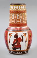 1924 Zsolnay egyiptizáló dekoros kisváza, a Tutanhamon sorozatból. Korongozott fehércserép, felületén többrétegű, színes eozinmázakkal festett egyiptomi dekorral. Terv: Zsolnay Teréz (1854 - 1944). Jelzése alján masszába nyomott 7662 formajegy, illetve vörös eozinmázon zöld színnel bélyegzett kerek öttornyos gyári jegy ZSOLNAY-PÉCS körirattal, alatta MADE IN HUNGARY felirat. Pereménél kis hajszálrepedés. /// A Zsolnay gyár jelen vázát is magába foglaló Tutanhamon sorozata beleilleszkedik abba a divathullámba, amit Tutanhamon fáraó sírjának 1922-es felfedezése indított el az iparművészetben. A Zsolnay Teréz által tervezett sorozat részét képező, jelen aukción szereplő kisváza formaterve a 7662-es formaszámon került bejegyzésre. m: 12 cm /  1924 Zsolnay Egyptian Revival Vase - Part of the Tutankhamun Series  Presenting an exquisite piece of Art Deco history, this Zsolnay vase from 1924 is a stunning example of the Egyptian Revival style, inspired by the discovery of Pharaoh Tutankhamuns tomb in 1922.  Crafted from glazed white earthenware with layers of vibrant eozin glazes, this vase bears the intricate Egyptian decoration that characterizes the Tutankhamun series. The design, attributed to Zsolnay Teréz (1854-1944), features rich, colorful patterns and motifs inspired by ancient Egypt.This piece is a testament to Zsolnays mastery in ceramics and their ability to capture the spirit of the times. The Egyptian Revival style, influenced by the fascination with Tutankhamuns treasures, left an indelible mark on the Art Deco era. m:12 cm
