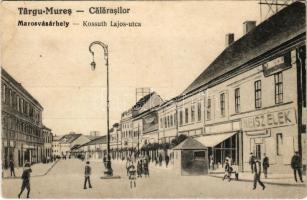 Marosvásárhely, Targu Mures; Kossuth Lajos utca, Weisz Elek üzlete / Calarasilor / street, shops (ázott / wet damage) + &quot;1940 Marosvásárhely visszatért&quot; So. Stpl