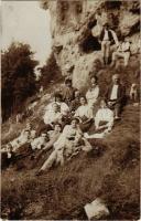 1910 Torda, Turda; kirándulók csoportképe a sziklák alatt / hiking people. photo