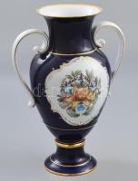 Hollóházi kétfüles váza. Kobaltkék alapfestés, aranykontúrozott kartusban virágminták. Jelzéssel, minimális kopottsággal, m: 29 cm