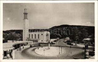 Budapest II. Pasarét, Páduai Szent Antal templom, hátul a Gugger-hegy, patika (gyógyszertár), posta, tejcsarnok, 5-ös autóbusz megálló, automobil, kerékpár. Simon László kiadása. D&#039; Isoz Lajos felvétele