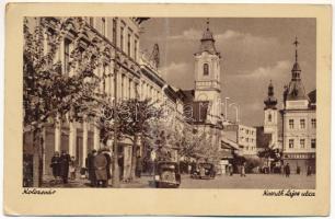 1941 Kolozsvár, Cluj; Kossuth Lajos utca, Evangélikus templom, automobilok, Nimberger üzlete / street view, Lutheran church, automobiles, shops (gyűrődések / creases)