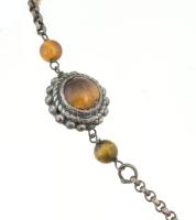 Ezüst (Ag) nyaklánc medállal, tigrisszem berakásokkal. Jelzett, bruttó 23,2 g, h: 46 cm