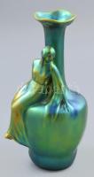 Zsolnay váza: Vágyakozás. Szecessziós stílusú nőalakkal díszített, szájánál virágszerűen szétnyíló váza, savmaratott felületén zöldes és arany eozinmázakkal festett. Alján jelzett. Minimális kopottsággal, m: 24,5 cm