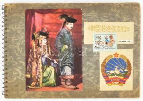 1967 Mongóliai utazás emlékalbuma, több mint 60 oldalon beragasztott fotókkal, kivágásokkal, bélyegekkel. Spirálfűzéses, harántalakú füzetben, 25x17 cm