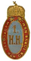 Osztrák-Magyar Monarchia ~1914-1918. Magyar Királyi 1. Honvéd Huszárezred aranyozott, zománcozott bronz sapkajelvény. MEGFOGYVA BÁR DE TÖRVE NEM (36x18mm) T:XF zománchiba / Austrian-Hungarian Monarchy ~1914-1918. Hungarian Royal 1st Honved Hussar Regiment gilt, enamelled cap badge (36x18mm) C:XF enamel error