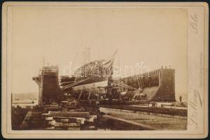 cca 1880 S.M.S. Miramar a szárazdokkban, Polában. Kabinetfoto Mioni műterméből / S.M.S. Miramar, viewed from the bow, is in dry dock.Cabinet photograph by L. Mioni, Pola,