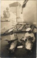 Osztrák-magyar haditengerészet matrózai újságolvasás közben a fedélzeten / K.u.K. Kriegsmarine Matrosen / Austro-Hungarian Navy mariners reading newspaper on deck. photo