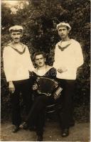 1918 Pola, Pula; K.u.K. Kriegsmarine / WWI Austro-Hungarian Navy, Three naval airmen, the left one is with the K.u.K. Seeflugstation, on the right is a member of the K.u.K Seefliegerkorps, one with accordion. photo