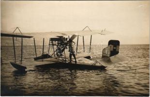 Abbazia, Opatija; K.u.K. Kriegsmarine Seeflugzeug / WWI Austro-Hungarian Navy, Schiffsleutnant Wenzel Wosecek oils the valves on the engine of his flying boat (hydroplane) E-16 (Lohner Eineinhalbdecker), naval aircraft. Eduard Batai photo (felületi sérülés / surface damage)