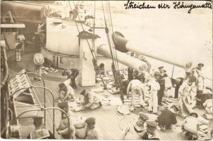 1916 K.u.K. Kriegsmarine Matrosen / Osztrák-magyar matrózok ellenőrzik és leporolják a hálószőnyegeiket / Austro-Hungarian Navy mariners checking and dusting off their sleeping mats. photo + "K.u.K. MARINEFELDPOSTAMT POLA a 15.6.16" + "S.M.S. ZRÍNYI"