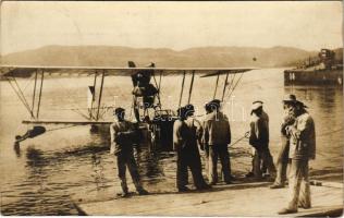 1918 K.u.K. Kriegsmarine Matrosen, Seeflugzeug, Torpedoboot / WWI Austro-Hungarian Navy, Mn-type flying boat (hydroplane) E-34 with mariners, SM Tb 14 torpedo boat in the background. photo + "K.u.K. MARINEFELDPOSTAMT POLA m 28.II.18" "Briefzensur des k.u.k. Seefliegerkorps Pola" (EK)