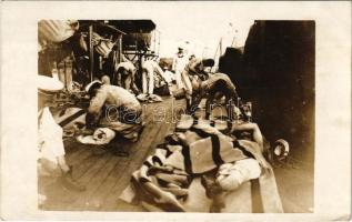 K.u.K. Kriegsmarine Matrosen / Osztrák-magyar matrózok készülnek össze ébresztő után / Austro-Hungarian Navy mariners getting ready after the reveille. photo (EK)