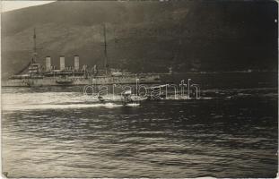 K.u.K. Kriegsmarine Seeflugzeuge / WWI Austro-Hungarian Navy, flying boats (hydroplane) S-5 (Albatross machine) and L-93, a T-type Lohner, sailing on the water, SMS Kaiser Karl VI in the background. photo