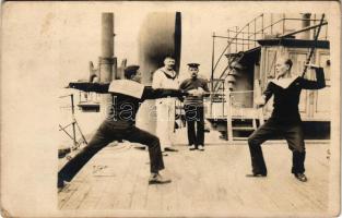 1917 Osztrák-magyar matrózok vívás közben a fedélzeten / K.u.K. Kriegsmarine Matrosen / Austro-Hungarian Navy mariners fencing on the deck. sport photo (EK) + "S.M. SCHIFF ,,KR. ERZH. RUDOLF"