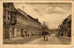 Segesvár, Schässburg, Sighisoara; Bajor utca, városi vasút, vonat, üzlet / Baiergasse / street view, urban railway, train, shops (fa)