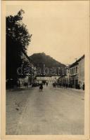 Huszt, Chust, Khust; Rákóczi utca, várrom, üzletek / street view, castle ruins, shops