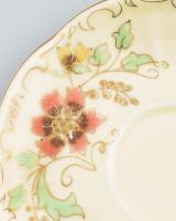 Zsolnay 2 darab aranykontúrozott virágmintás csésze alátéttel. Jelzett, kopással, d: 15 cm