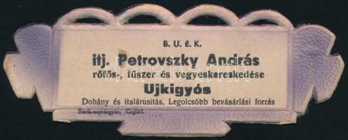 cca 1930 Petrovszky András rőfös fűszer és vegyeskereskedés Újkígyós kis méretű karton reklámtábla újévi üdvözlettel, 6×15 cm