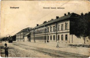 1909 Budapest VIII. Honvéd huszárlaktanya (M. kir. központi honvéd lovasiskola), villamos. Üllői út 82. (felületi sérülés / surface damage)