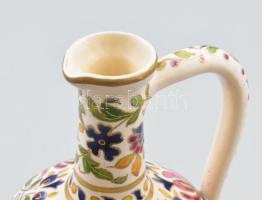1888 Schütz Kerámiagyár, Díszkancsó. Aranykontúrozott népies virágmintákkal festett finomfajansz. Je...