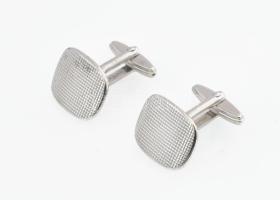 Ezüst(Ag) mandzsettagomb, jelzett, reszelés nyomával, nettó: 10,1 g