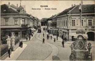 Újvidék, Novi Sad; Duna utca, villamos, Ivkovic Milan és Dietzgen üzlete. Hajós tőzsde kiadása / street, tram, shops