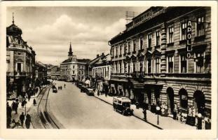 Miskolc, Széchenyi utca, Korona szálló, Apollo mozi, autóbusz és autók, dohány bélyeg váltó